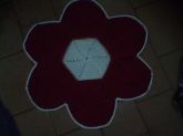 Tapete em barbante em forma de flor